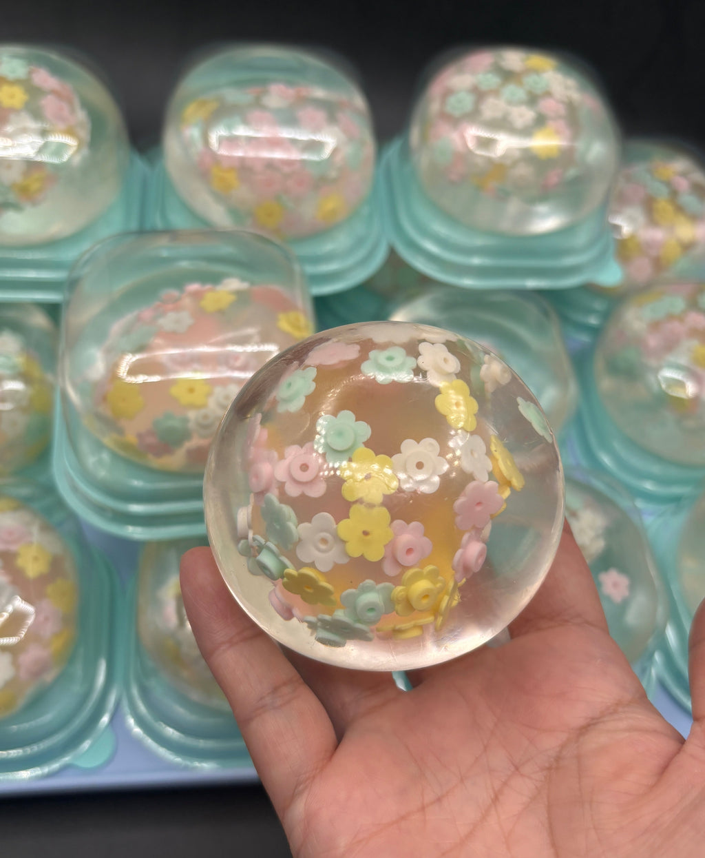 [very firm] cherry blossom stressball (coconut oil + clear putty zip tie)